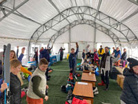 Inside the DAGB Series™ fabric building at Bluebird Backcountry, skiers benefit from a roomy, weather-shielded space that meets the demands of backcountry skiing activities.