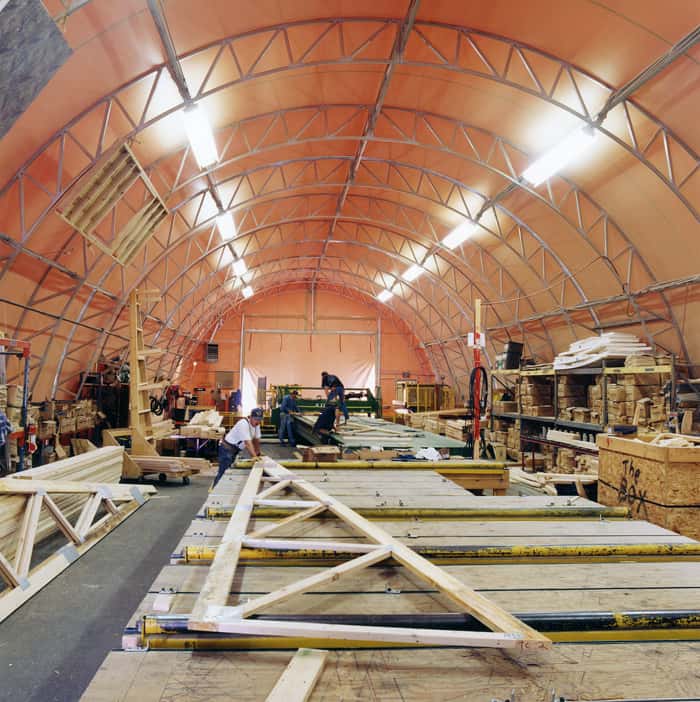 Interior GTX gable truss fabric structure work shop.