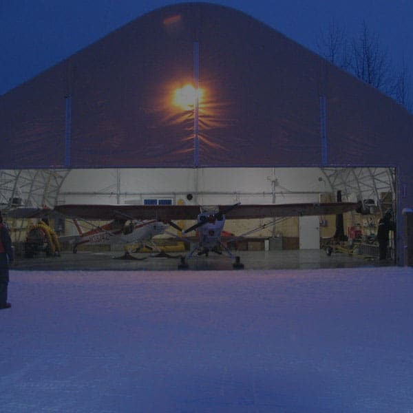 https://alaskastructures.com/wp-content/uploads/2022/01/alaska-structures-aircraft-hangar-3-600x600-50pBlk.jpg