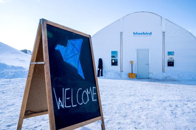 Alaska Structures backcountry ski facility Bluebird Backcountry in Jackson County, Colorado utilizes a DAGB Series™ fabric building from Alaska Structures® to house their backcountry ski facility, offering a durable and weather-resistant space for skiers.