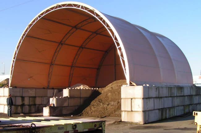 An open-ended salt and sand storage building provides a convenient area to safely store bulk materials.