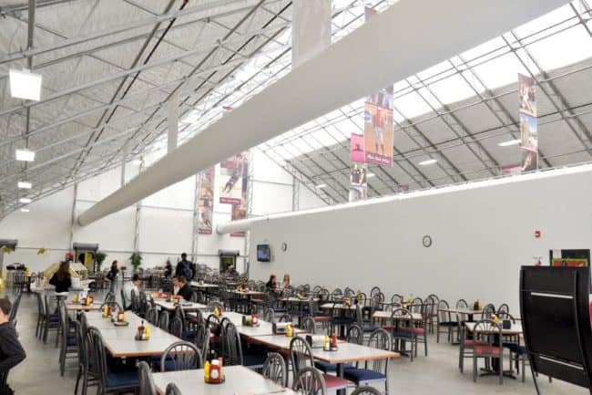 Alaska Structures college dining facility and bookstore interior The interior of the student dining hall and bookstore at Mesa State College features a DAGB Series™ fabric building from Alaska Structures®.