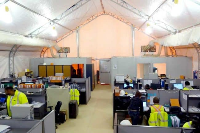 alaska-structures-dagb-fabric-building-for-on-site-modular-offices-2 The interior of a DAGB Series™ fabric building, equipped with HVAC systems and customer-installed hard-wall partitions, provides a spacious and comfortable onsite modular office for workers and management at a remote construction camp.
