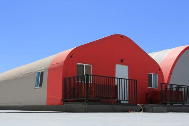 Alaska Structures Denali fabric building for on-site modular offices A temperature-controlled modular office building, featuring a 24' wide x 60' long HGB Series™ fabric building from Alaska Structures®, provides an ideal workspace for mine site directors and managers to ensure smooth mining operations.