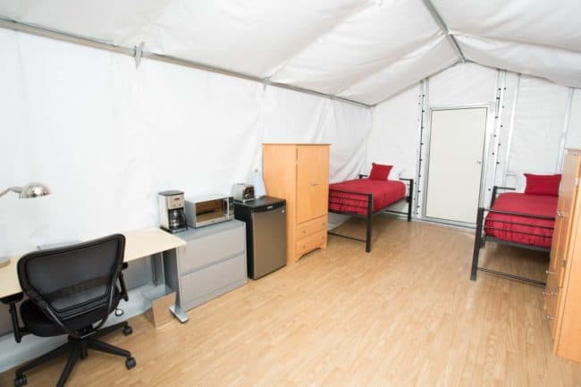 Alaska Structures GB modular building for workforce housing 2-person sleeper A 12' wide x 20' long 2-person sleeper offers ample space for beds, individual closets, workstations, and a small kitchenette, ensuring a comfortable and functional living area.