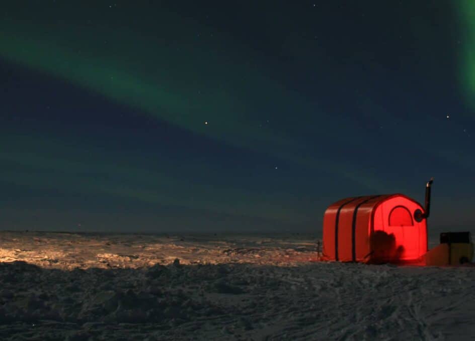 alaska-structures-gb-survival-shelter-1 Remote nighttime operations in cold climates pose risks of life-threatening temperatures and sudden storms; a light inside the GB Series™ survival shelter ensures it remains a highly visible refuge for workers in emergencies.