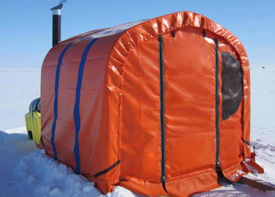 Alaska Structures GB survival shelter A close-up view of the GB Series™ survival shelter, equipped with an oil heater and used by Discovery Mining Services, offers critical protection for workers at a remote exploration camp when sudden, life-threatening weather strikes.