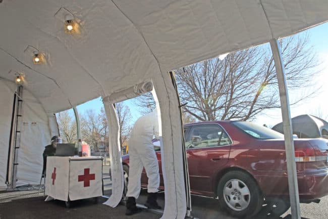 An interior view of a heated and insulated drive-through testing and vaccination facility from Alaska Structures®.