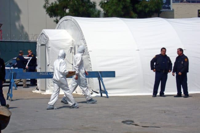An SQ Series™ fabric building with a vestibule entry from Alaska Structures® is used as a HAZMAT shelter during an exercise in Anaheim, California, providing a secure and controlled environment for hazardous materials training.