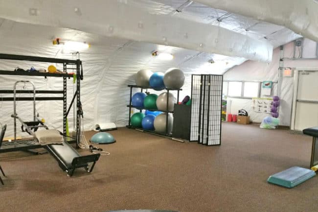 Alaska Structures physical therapy and rehabilitation -center A physical therapy and rehabilitation center expanded their facility by using an HGB Series™ fabric building from Alaska Structures®.