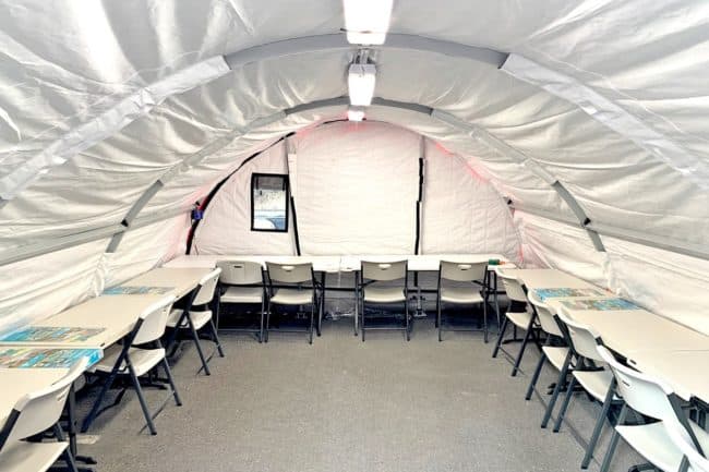 Alaska Structures wildfire command center The interior of a rapidly deployable command center for Utah County Emergency Management, Search and Rescue, utilizing an XPL Series™ fabric building from Alaska Structures®, provides a secure and efficient space for emergency operations.