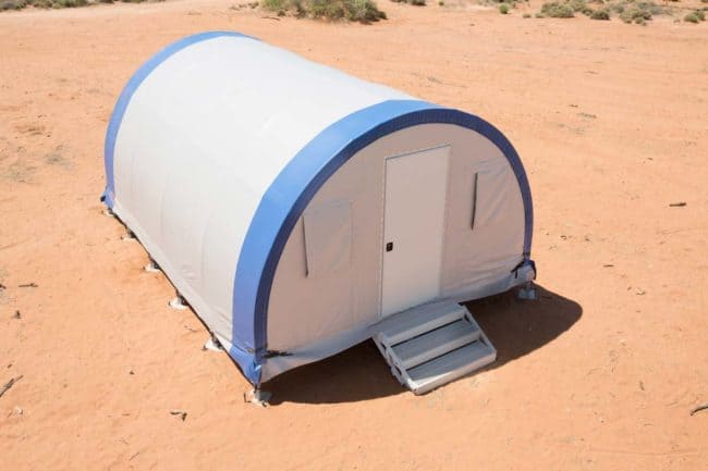 Alaska Structures homeless shelter and navigation center SQ Series An individual homeless shelter using an SQ Series™ fabric building from Alaska Structures® is equipped with an optional modular floor system, allowing for stable deployment on uneven terrain.