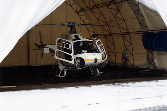Helicopter in GTX Series fabric aircraft hangar from Alaska Structures.