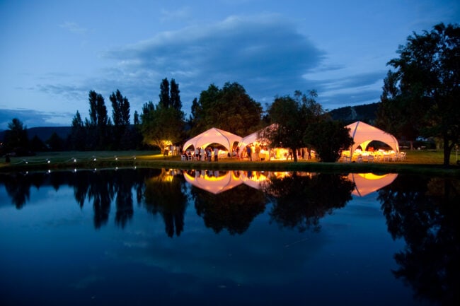 weatherport-hexapae-30-diameter-used-for-outdoor-party-2 An outdoor event using (3) 30’ diameter WeatherPort® canopy structures.