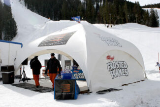 Kellog’s promotes their Frosted Flakes® at an outdoor event using a 20’x20’ WeatherPort® Canopy with printed logos.