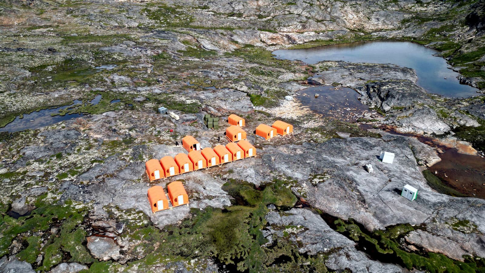 fly-in-camp-for-gold-mining-in-south-greenland-1 Fly-in camp for gold exploration in South Greenland featuring GB Series™ fabric buildings, providing durable, rapidly deployable shelter solutions in remote, high-latitude terrain.