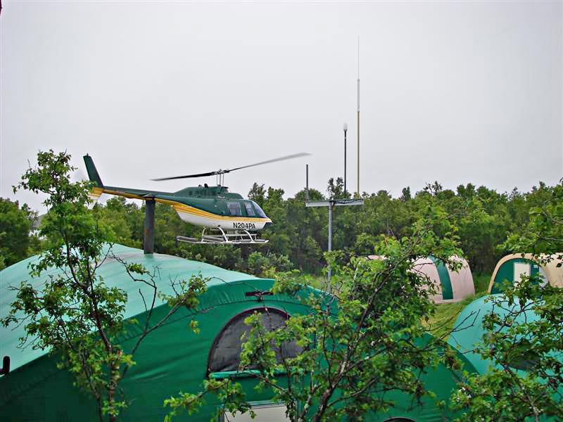 fly-in-camp-hallo-bay-wilderness-camp-alaska-1 Fly-in camp at Hallo Bay Bear Camp in Katmai National Park, Alaska, accessible primarily by aircraft and utilizing engineered fabric structures to support remote operations in coastal wilderness environments. The camp remained in service for 19 years before being disassembled and relocated in 2015, demonstrating long-term durability and redeployability.