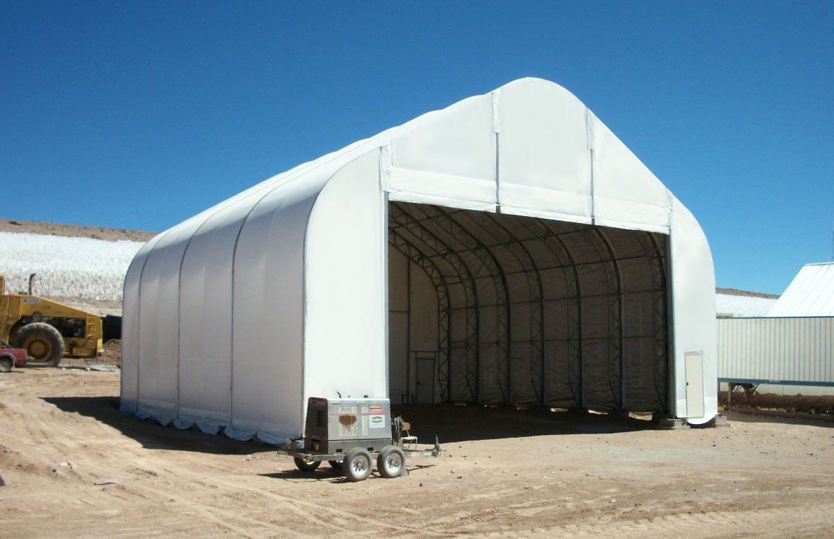 mining-truck-repair-facility-for-a-large-lithium-mining-operation-in-the-atacama-region-of-chile-3 This engineered fabric building from Alaska Structures® was designed to support onsite mining truck repair, heavy equipment servicing, and fleet maintenance operations for a large lithium mining operation in the Atacama region of Chile.
