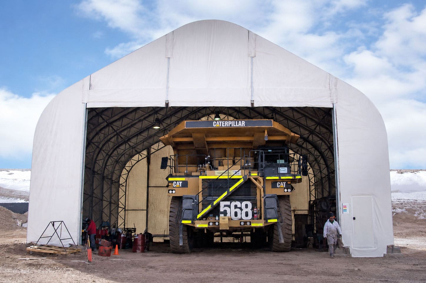 mining-truck-repair-facility-for-a-large-lithium-mining-operation-in-the-atacama-region-of-chile-4 This engineered fabric building from Alaska Structures® provides a protected onsite mining truck repair facility designed to support heavy equipment maintenance operations in the harsh environmental conditions of the Atacama region of Chile.