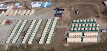 Aerial view of a Siberian mining camp after a 200-person expansion with additional fabric buildings