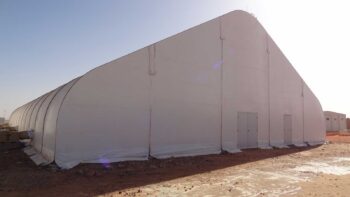 70 x 130 ft fabric building used as a recreation facility at a West African mining camp, with Alaska ECU units